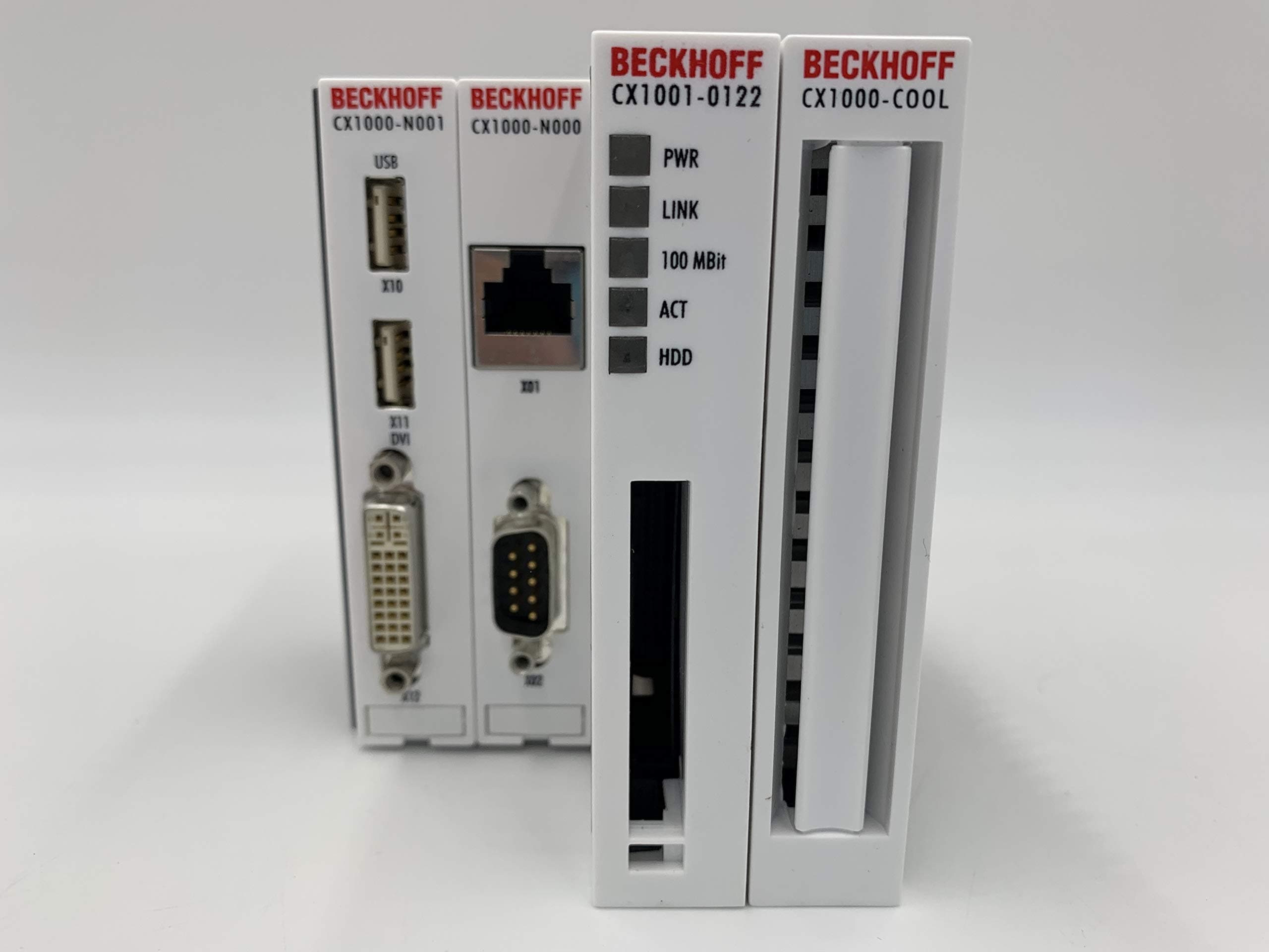 CX1001-0122 Beckhoff Basic CPU Module CX1000 PLC Controller CX10010122 128 MB RAM DVI/USB Microsoft Windows XP Embedded TwinCAT 2 CX1001 0122