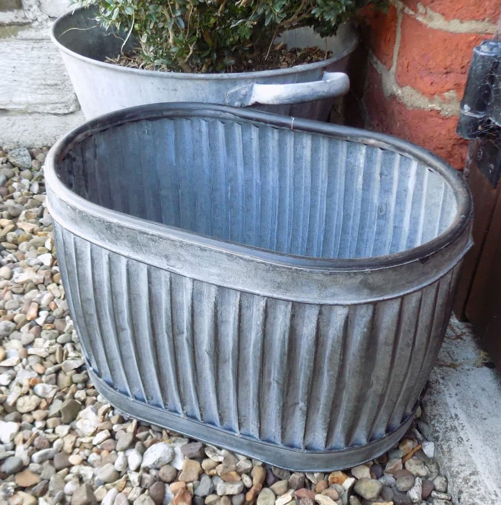 Small vintage style galvanised oval dolly planter