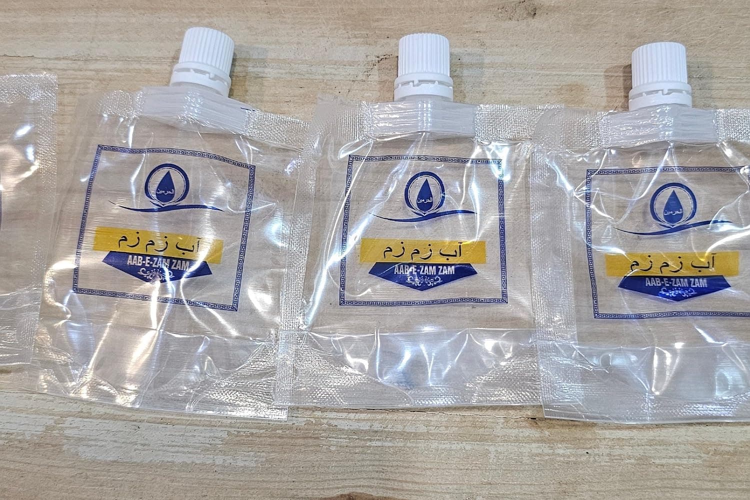 Zam Zam WATER BOTTLES Transparent Empty Refillable Flat Plastic Bottles especially AAB-E- ZAM ZAM written on it,Capacity 90 ml(PACK of 30)