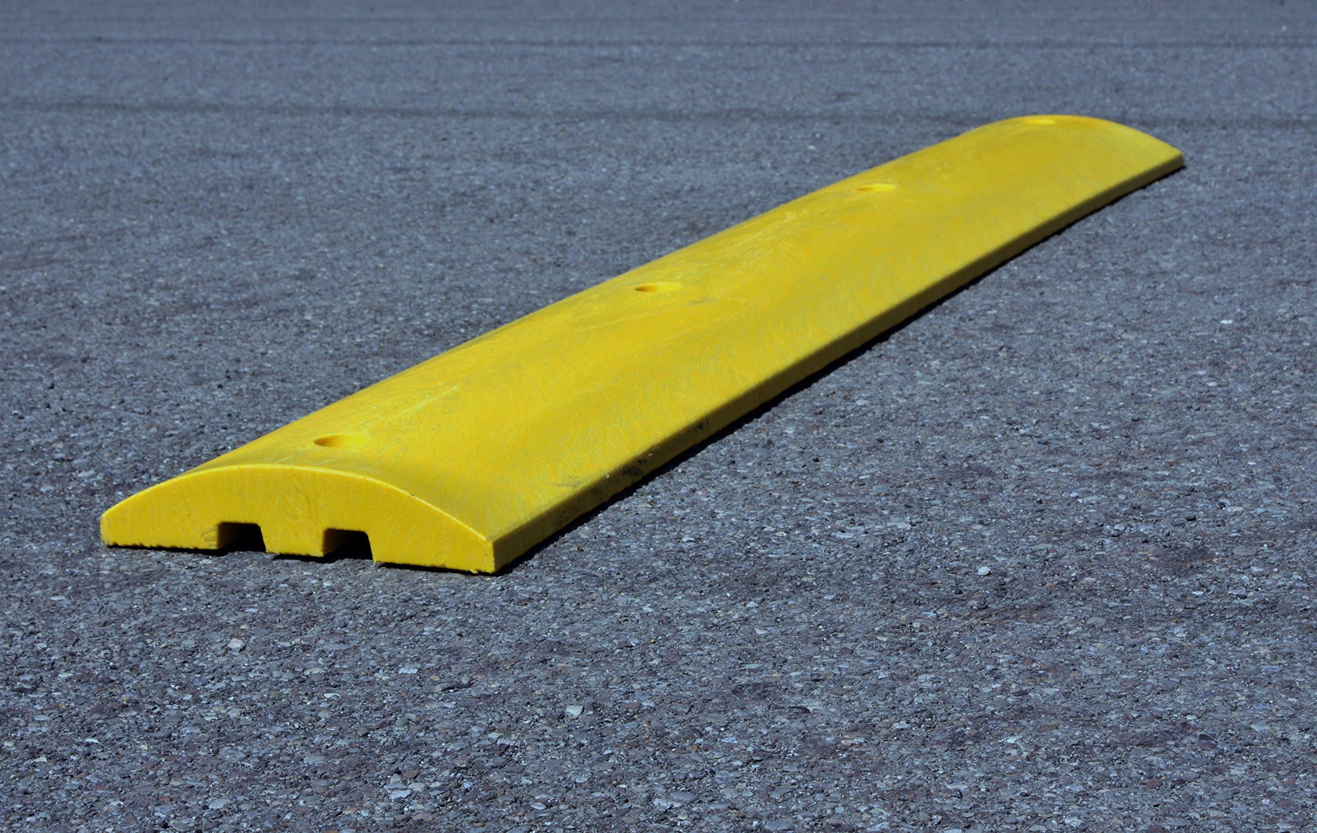 4' Yellow Plastic Speed Bump Standard with Channels 48"x10"x2", Includes lag Bolts